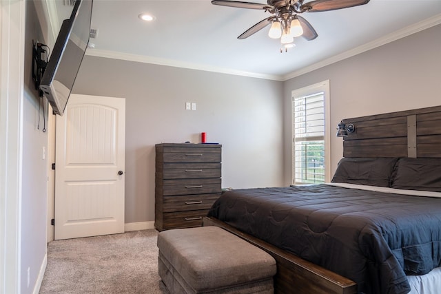 bedroom with carpet floors, crown molding, baseboards, ceiling fan, and recessed lighting