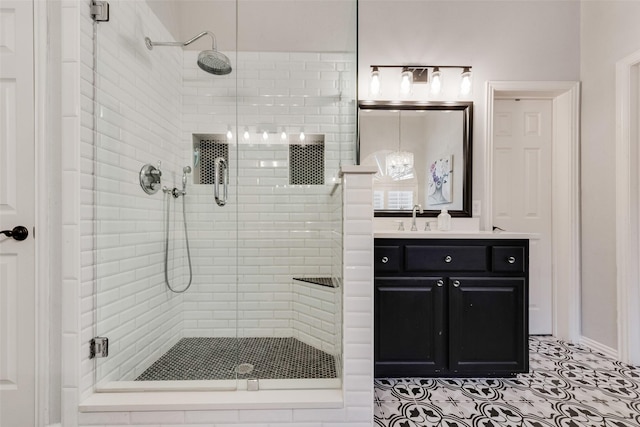 full bathroom featuring vanity and a stall shower