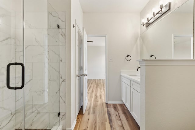 4413 Blackberry Rd, Melissa, TX 75454 - full bathroom featuring wood finished floors, a marble finish shower, and vanity