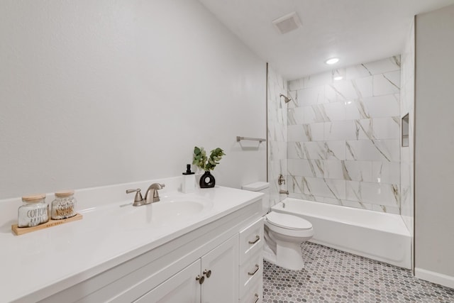 bathroom with toilet, washtub / shower combination, and vanity