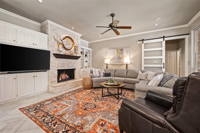 living room with ceiling fan, ornamental molding, recessed lighting, and a stone fireplace