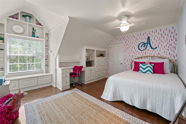 bedroom with dark wood-type flooring, ceiling fan, and vaulted ceiling