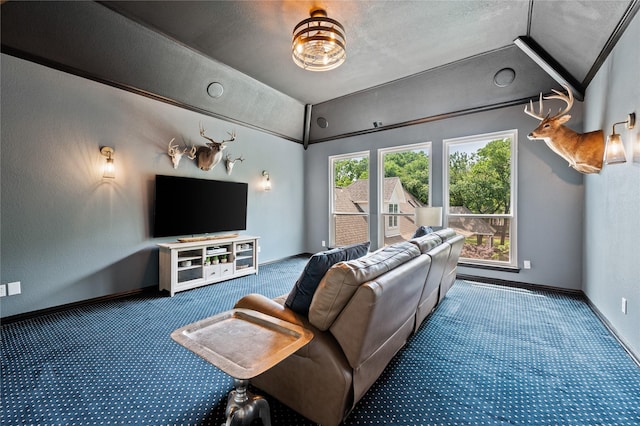 carpeted living room featuring a textured ceiling, baseboards, and vaulted ceiling