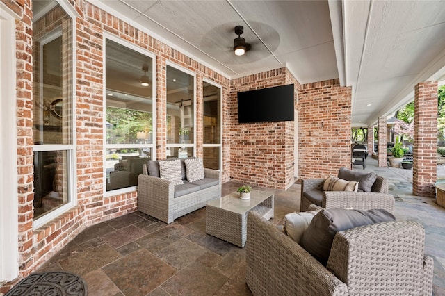 view of patio / terrace featuring ceiling fan, grilling area, and outdoor lounge area