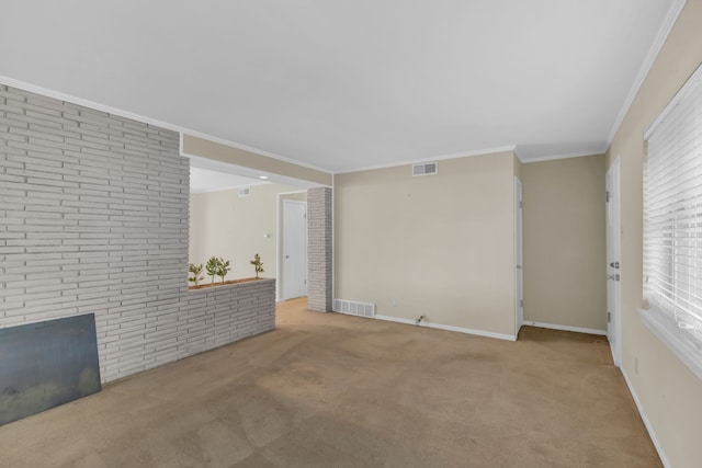 unfurnished living room with crown molding, baseboards, visible vents, and carpet