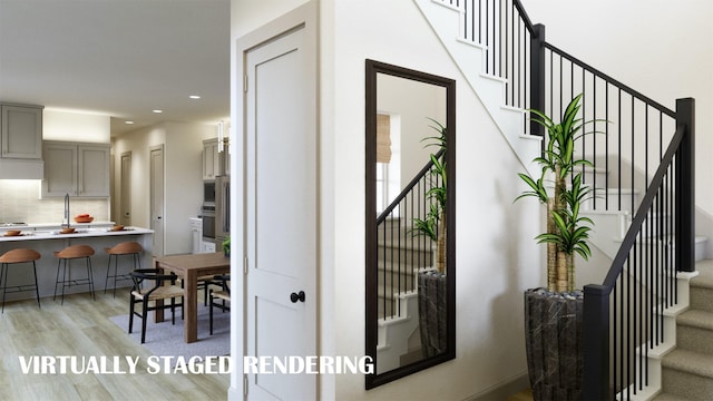interior space with recessed lighting and wood finished floors