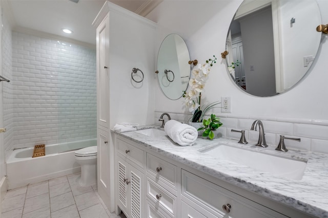 3400 Shenandoah St, University Park, TX 75205 - bathroom with toilet, bathtub / shower combination, double vanity, and a sink