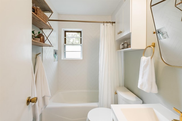 bathroom with vanity, shower / bath combination with curtain, and toilet