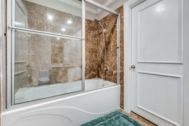bathroom with crown molding and enclosed tub / shower combo