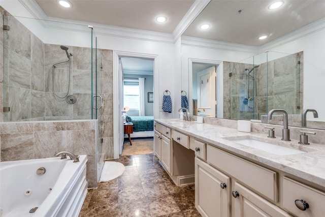 bathroom with a sink, crown molding, a stall shower, and double vanity