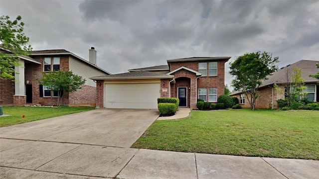 traditional-style home with concrete driveway, brick siding, a front yard, and a garage