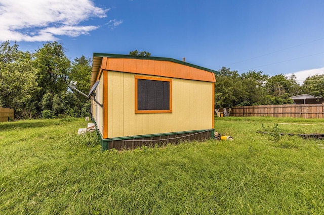 view of outdoor structure with an outdoor structure and fence
