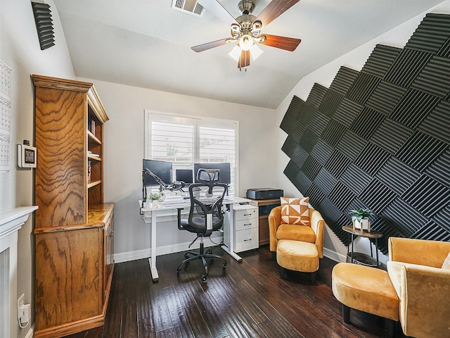 office space featuring ceiling fan, visible vents, baseboards, dark wood-style floors, and lofted ceiling