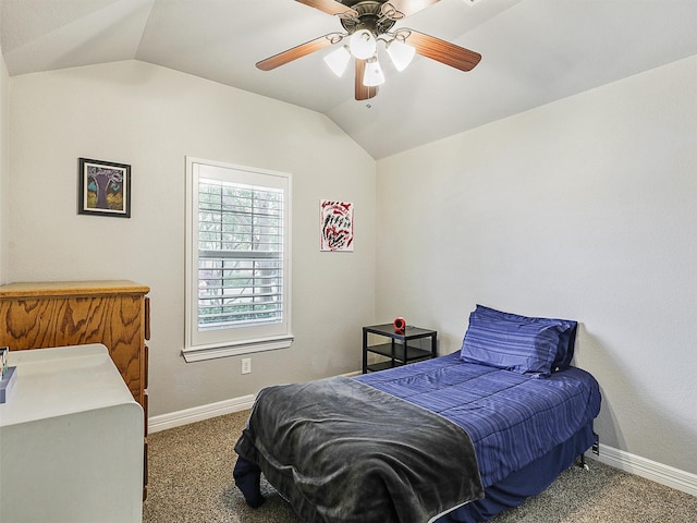 bedroom featuring baseboards, vaulted ceiling, and carpet flooring