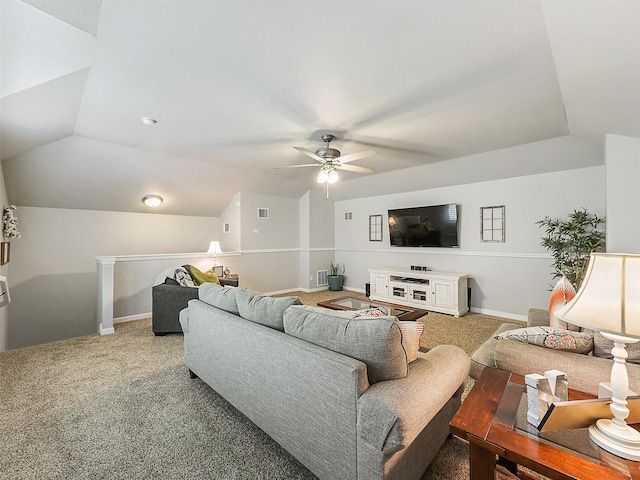 carpeted living room featuring visible vents, a ceiling fan, baseboards, and lofted ceiling