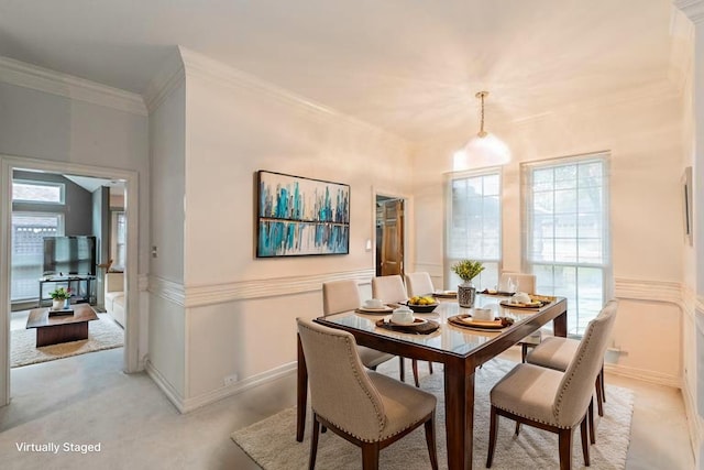 7917 Kendra Ln, North Richland Hills, TX 76182 - dining area with light carpet, crown molding, and baseboards