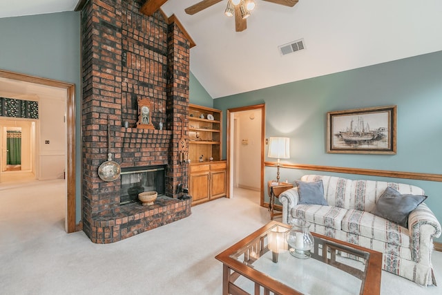 7917 Kendra Ln, North Richland Hills, TX 76182 - carpeted living room featuring ceiling fan and a fireplace