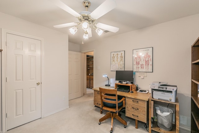 office with ceiling fan and light colored carpet