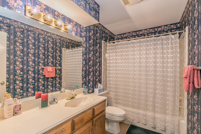 7917 Kendra Ln, North Richland Hills, TX 76182 - full bathroom featuring wallpapered walls, vanity, toilet, and shower / bathtub combination with curtain