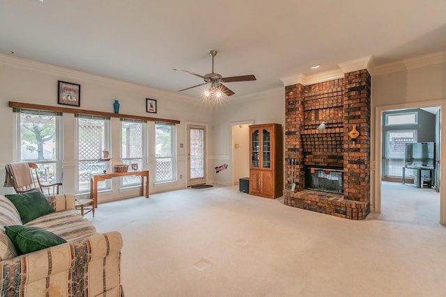 7917 Kendra Ln, North Richland Hills, TX 76182 - carpeted living area featuring crown molding, a fireplace, and ceiling fan