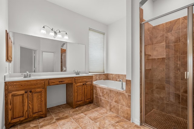 full bathroom with double vanity, a shower stall, a sink, and a bath