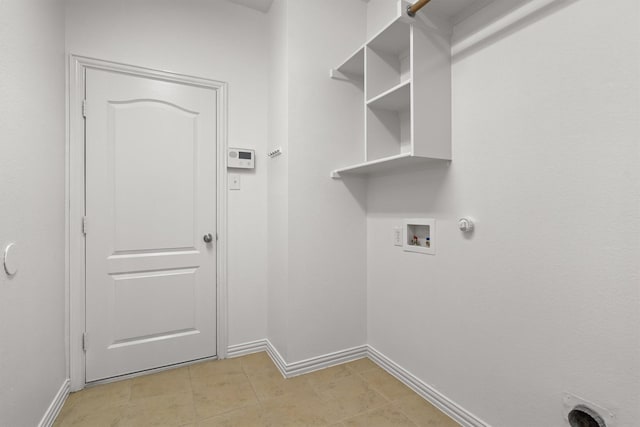 laundry area with gas dryer hookup, baseboards, laundry area, and washer hookup