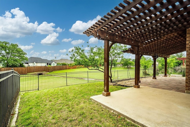 view of yard with a patio, a fenced backyard, and a pergola