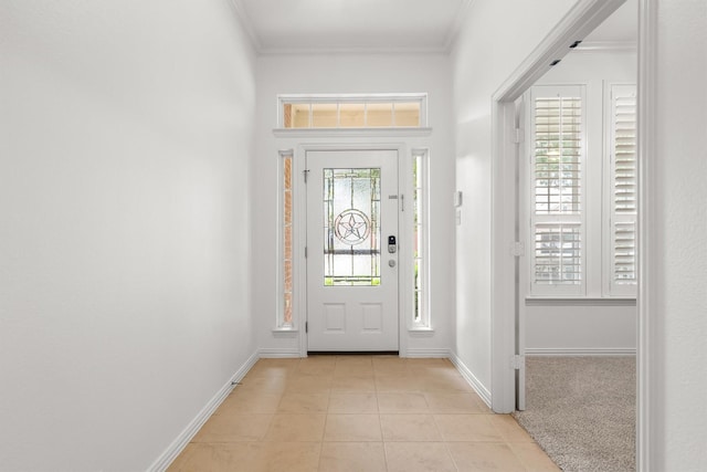 1390 Bonham Pkwy, Lantana, TX 76226 - foyer with light tile patterned floors, ornamental molding, and baseboards