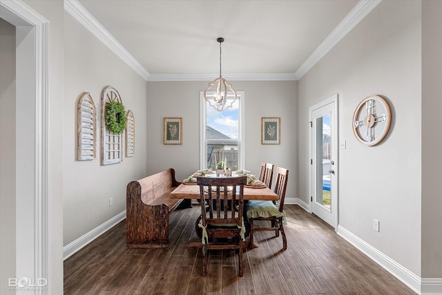 dining room with baseboards, a chandelier, dark wood-style floors, and ornamental molding