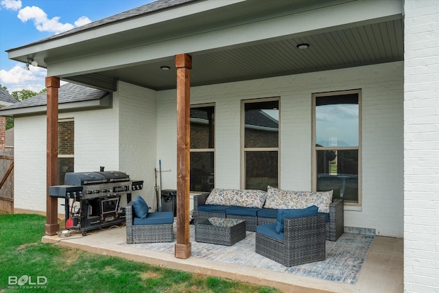 view of patio / terrace with area for grilling and an outdoor living space