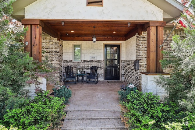 view of patio / terrace featuring visible vents and a porch