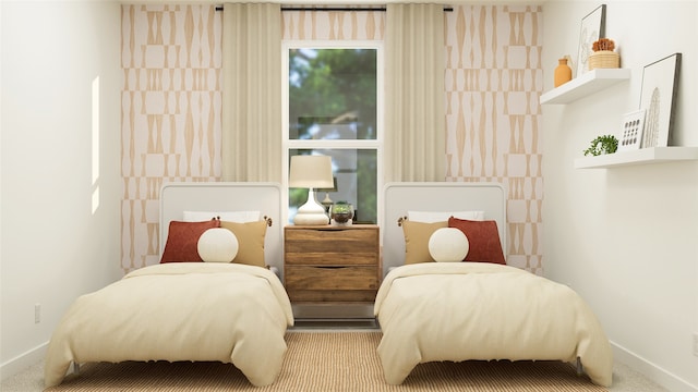 carpeted bedroom with baseboards