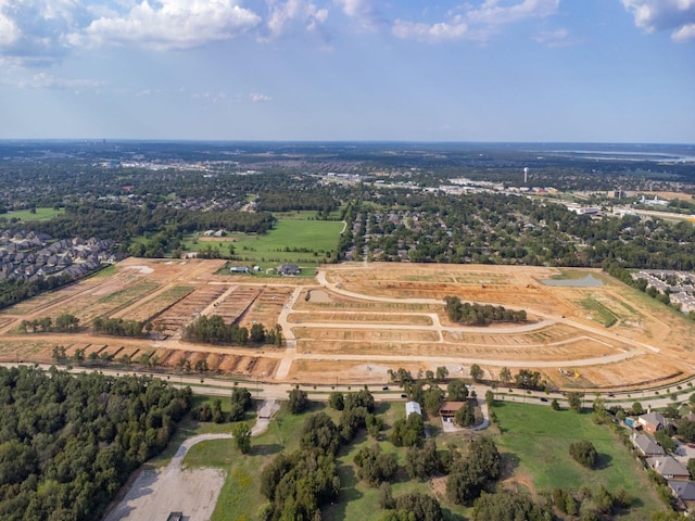 birds eye view of property with a rural view