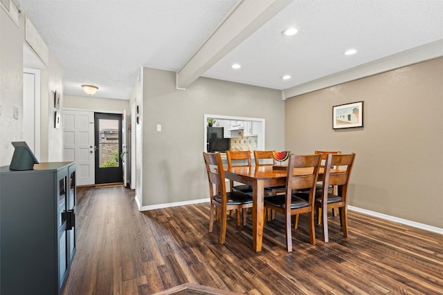 dining room with beam ceiling, baseboards, dark wood-style floors, recessed lighting, and a textured ceiling