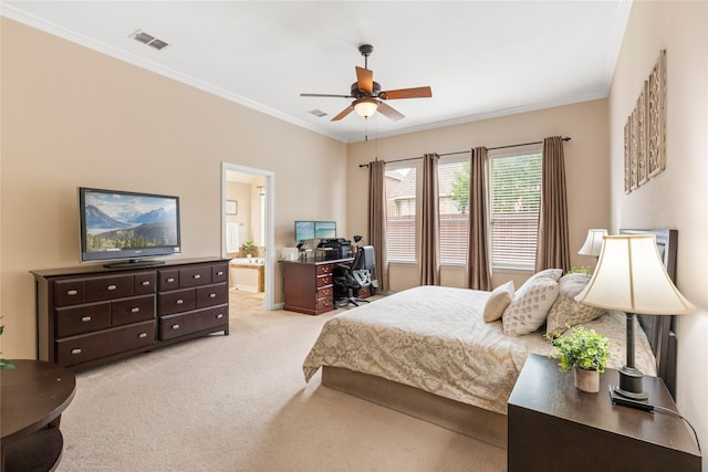 bedroom featuring crown molding, connected bathroom, light colored carpet, a ceiling fan, and visible vents