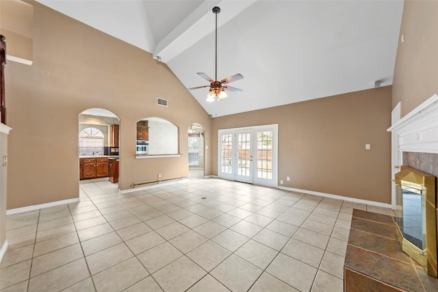 2806 Glenwick Ct, Richardson, TX 75082 - unfurnished living room with a ceiling fan, high vaulted ceiling, a fireplace, light tile patterned flooring, and baseboards