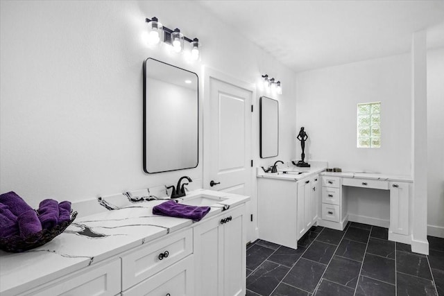 full bath with a sink and two vanities