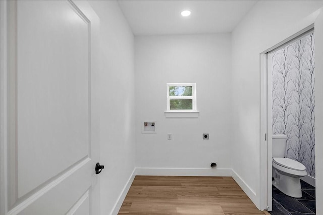 washroom featuring hookup for a washing machine, recessed lighting, baseboards, wood finished floors, and hookup for an electric dryer