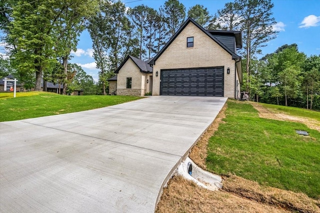 view of front of property with driveway, a front lawn, and brick siding