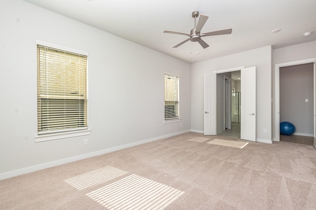4313 Brookridge Ave, Mckinney, TX 75071 - unfurnished bedroom with baseboards, multiple windows, and carpet flooring