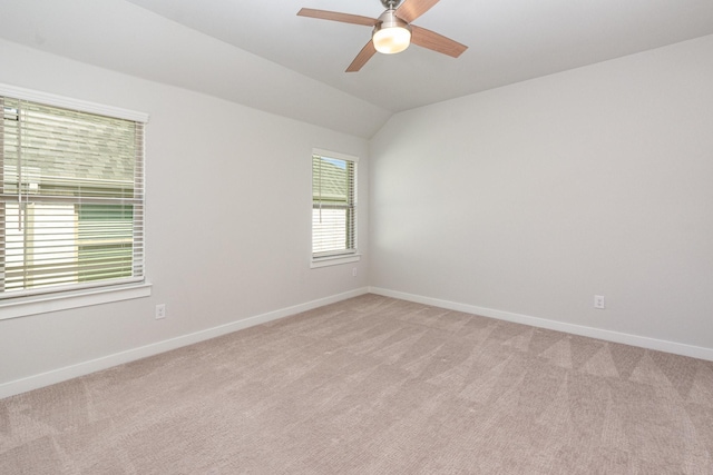 4313 Brookridge Ave, Mckinney, TX 75071 - empty room featuring light colored carpet, baseboards, ceiling fan, and vaulted ceiling