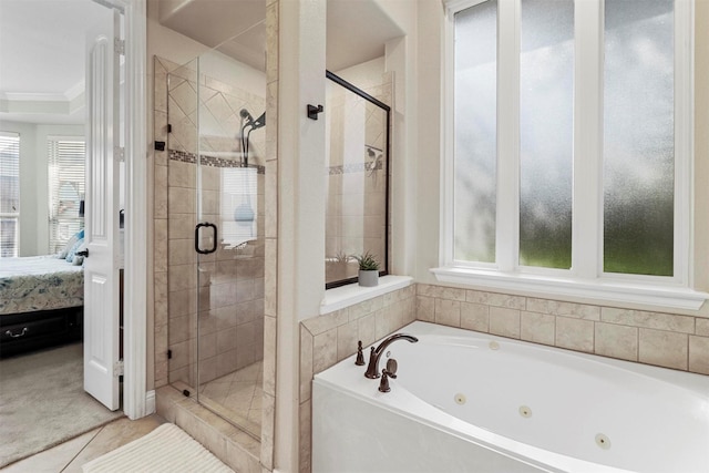 ensuite bathroom featuring tile patterned flooring, crown molding, a whirlpool tub, connected bathroom, and a stall shower