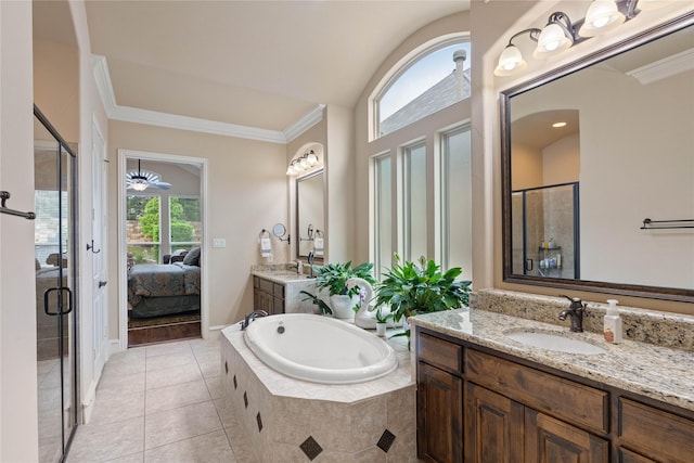 5916 River Highlands Dr, Mckinney, TX 75070 - ensuite bathroom featuring a stall shower, crown molding, tile patterned flooring, a bath, and two vanities