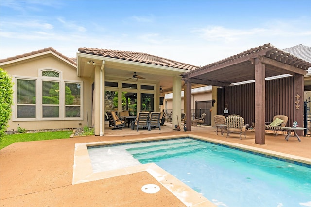 5916 River Highlands Dr, Mckinney, TX 75070 - back of house featuring a pergola, a patio area, ceiling fan, and an outdoor pool