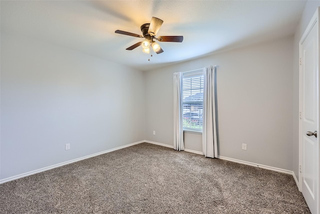 unfurnished room featuring ceiling fan, baseboards, and dark colored carpet