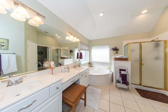 full bathroom featuring a sink, a jetted tub, vaulted ceiling, and a stall shower