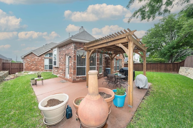 view of patio / terrace with a fenced backyard and a pergola