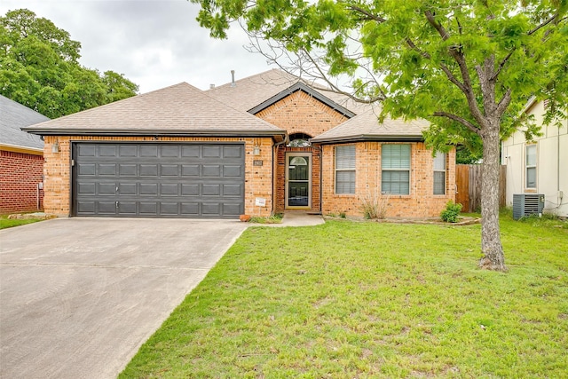 single story home with a front lawn, brick siding, a garage, cooling unit, and concrete driveway