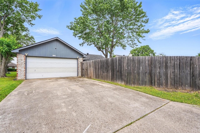 garage with fence
