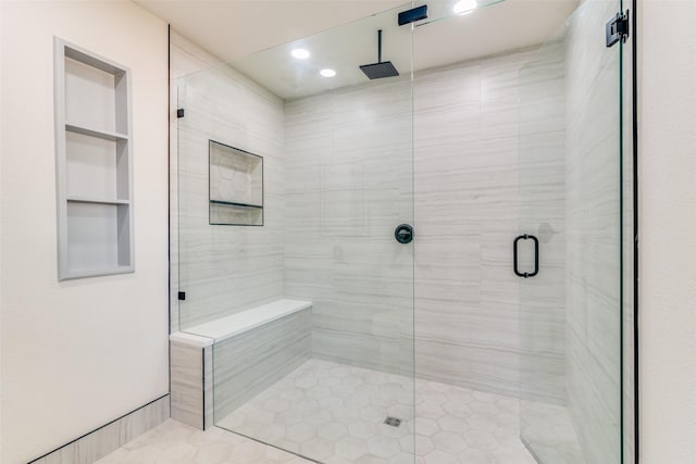 2223 Foxcroft Cir, Denton, TX 76209 - bathroom with tile patterned flooring, a shower stall, recessed lighting, and built in shelves